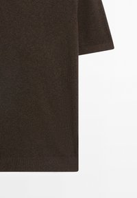 Dark brown short sleeve knit sweater with ribbed texture and hem on plain white background.