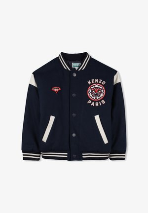 Veste varsity navy avec des accents blancs, un emblème de tigre et le texte "KENZO PARIS" ; comprend des poignets côtelés et deux poches avant.