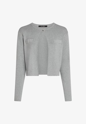 Cárdigan gris con mangas largas, con apertura frontal y dos bolsillos de parche. Fabricado en una tela suave y texturada con detalles acanalados en los bordes.