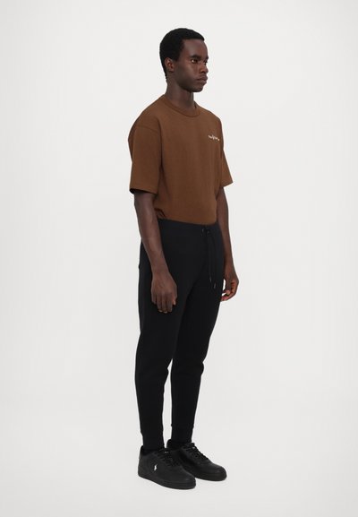 Polo Ralph Lauren ATHLETIC - Pantaloni sportivi - black