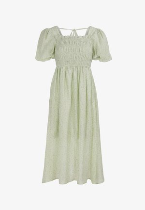 Robe midi vert clair avec manches courtes bouffantes, corsage smocké, imprimé floral subtil et lien à nouer à l'encolure.