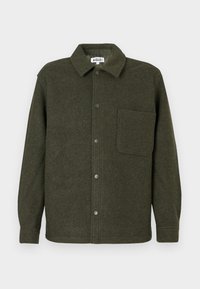 Vihreä villapaita-takki, jossa on kaulukset, etuvetoketju, yksi rintatasku ja pitkät hihat. Sileä, teksturoitu pinta.