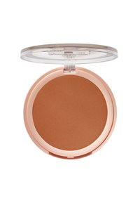 Compact rond avec un couvercle transparent, contenant de la poudre bronzante mate de couleur marron chaud. Texture douce ; boîtier extérieur en rose clair.