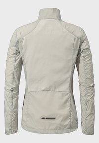 Hellgraue Sportjacke mit hohem Kragen, strukturiertem Stoff und dehnbaren Ärmeln. Sie hat minimalistische schwarze und blaue Akzente.