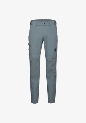Pantalons d'extérieur gris en matériau léger, avec des sections de genoux renforcées, une poche zippée sur le côté et un patch logo.