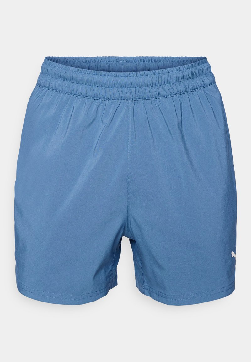 Pantalones cortos deportivos azules con una cinturilla elástica, textura suave y un pequeño logo blanco en el lado inferior. Diseño simple, sin bolsillos.