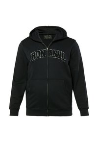 Black zip-up hoodie made from soft fabric, featuring a kangaroo pocket and a hood. The front displays the text "IRON ANVIL" in contrasting white.