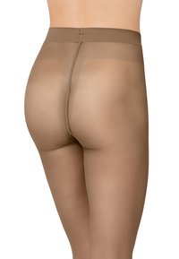 Genomskinliga hudfärgade strumpbyxor med en slät, matt textur och en mjuk midjeresår. Har en sömlös bakdesign för en bekväm passform.