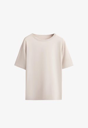 T-shirt à manches courtes de couleur beige clair, fabriqué en tissu doux. Doté d'un col rond, d'une coupe décontractée et d'un design uni sans motifs ni accents.