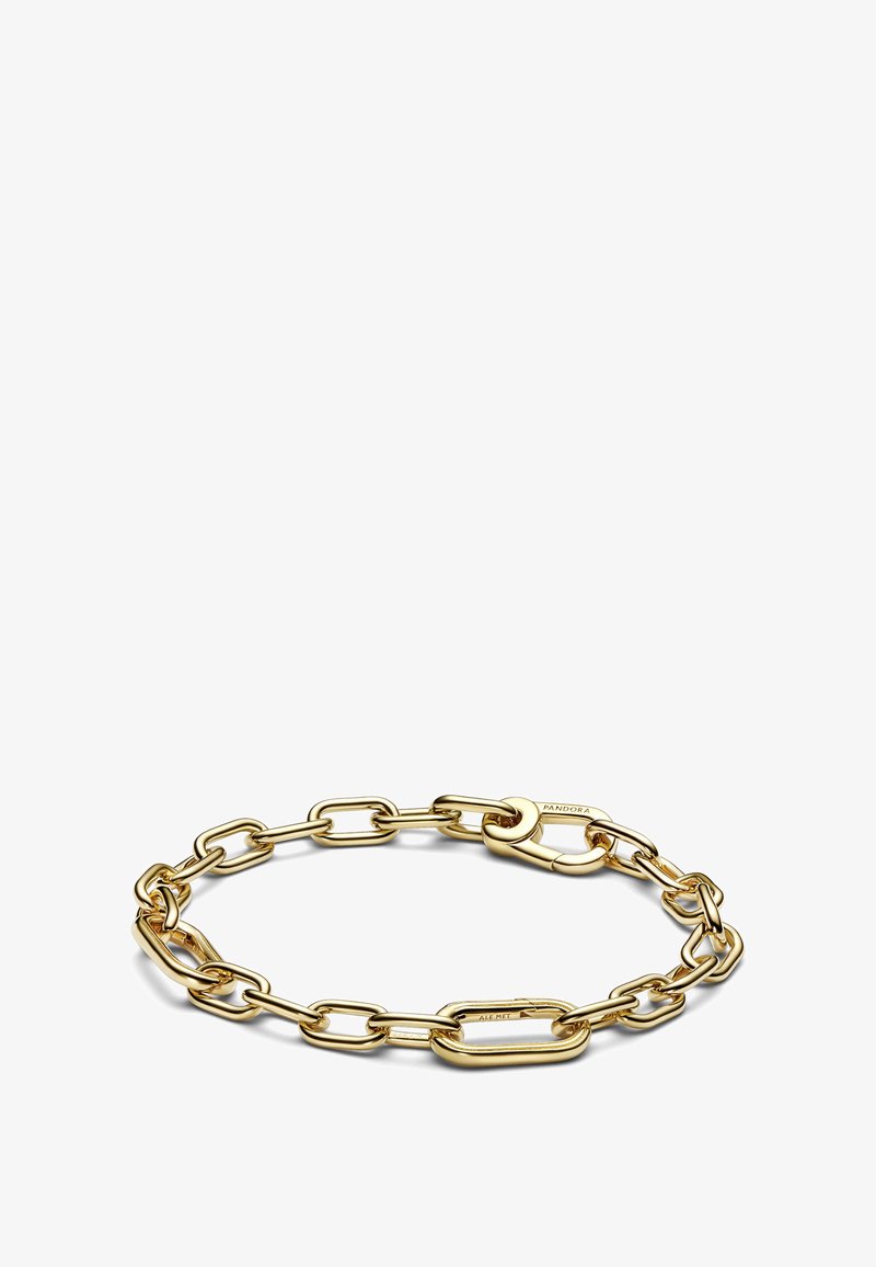 Pulsera de cadena en tono dorado con eslabones ovalados y un cierre seguro, que exhibe una textura suave y un diseño minimalista.
