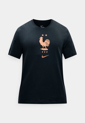 Crna Nike majica s kratkim rukavima s bakrenim grbom pijetla, dvije zvjezdice iznad, slovima FFF i Nikeovim logotipom na prsima.