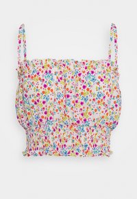 Blommig crop top med tunna axelband. Vitt tyg med flerfärgat blommönster. Resår i midjan för stretch.