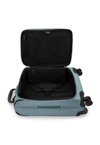 Light blue suitcase with a rectangular shape. Open interior features a black mesh zipper pocket and black straps for securing items.