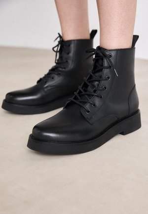 Bottines à plateau - black