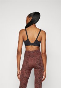 Hunkemöller THE ALL STAR - Športni modrček s srednjo podporo - black