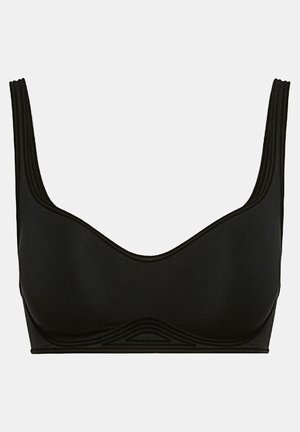 Svart bralette med en slät yta, breda axelband och en V-formad halsringning. Har diskreta, böjda detaljer längs kanterna.