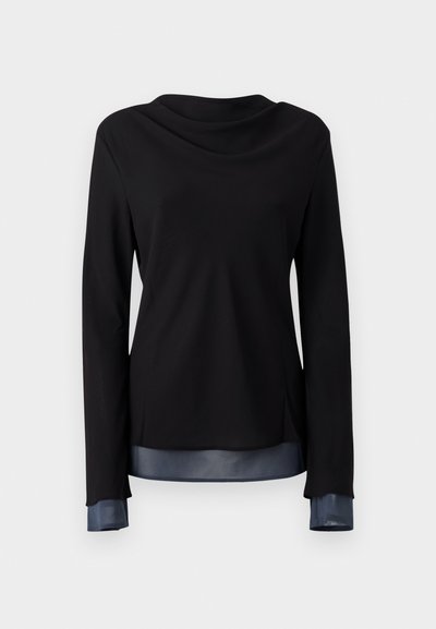 Black long-sleeve top with a draped neckline, featuring a satin-like blue hem and cuffs for a layered texture contrast.