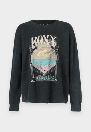 Black long-sleeve sweatshirt with ribbed texture, featuring a colorful graphic of a sunset and beach scene, labeled "ROXY."