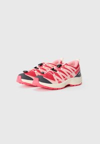 Red and pink athletic shoes with mesh upper, black accents, and a textured sole. Features quick-lace system and padded collar for comfort.