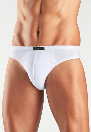 Weiße Baumwollunterhosen mit schwarzem Taillenbandschild. Sie zeichnen sich durch einen klassischen Schnitt, glatte Textur und minimalistisches Design aus.