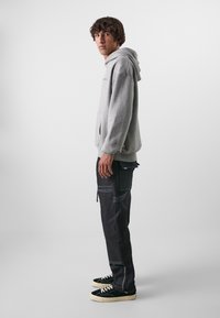 Don't Waste Culture KAJAL UNISEX - Calças de ganga folgadas - raw denim dark blue