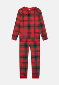 Rood en groen geruiten pyjama-set. Langdurige top met ribgebreide manchetten en broek met een elastische tailleband. Zacht, katoenmix materiaal.