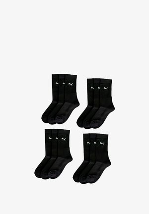 Puma black socks, ribbed cuff, short crew style, with white logo accents on the exterior. Set of six pairs, made from a soft fabric.