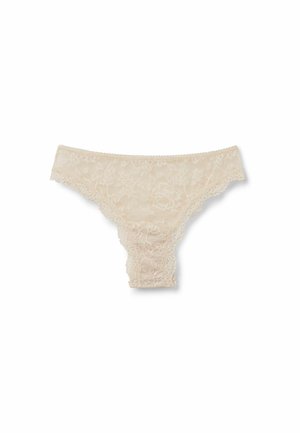 Tanga de encaje crema con patrón floral, bordes ondulados y textura suave. Cuenta con laterales ajustables para mayor comodidad y ajuste.