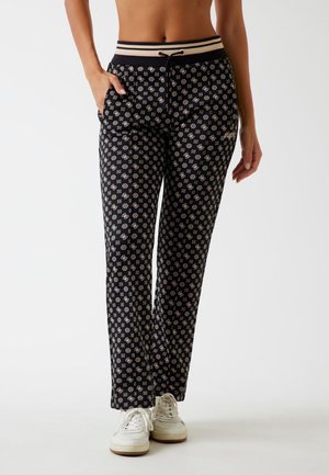 LOGO - Tracksuit bottoms - mehrfarbig schwarz