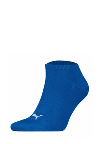 Calcetín azul hasta el tobillo hecho de una tela de punto texturizada, con un acento de logo blanco en el lateral. Diseño de punta y talón suave.