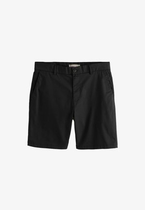 Čierne šortky na mieru po kolená s predným zapínaním na gombík a zips, s pútkami na opasok a bočnými vreckami.