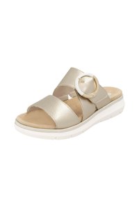 Gold-tone slide sandal with two wide straps, a circular gold and white buckle, and a cushioned beige footbed. Lightweight white sole.