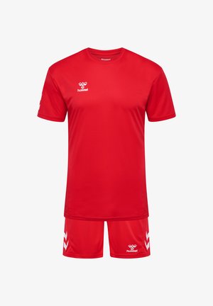 Red athletic jersey and shorts set made of smooth fabric. Features white logo and chevron accents on the sleeves and shorts.