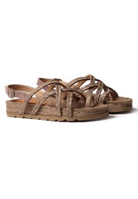 Sandales en corde marron avec des sangles croisées, semelle intérieure texturée et bride de cheville ajustable. Semelle épaisse et striée pour une meilleure adhérence et stabilité.