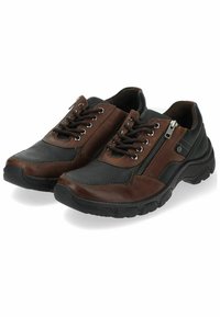Scarpe in pelle marrone e nera con design a lacci, dettagli con zip, cuciture a contrasto e suola in gomma texturizzata. Adatte per un abbigliamento casual.