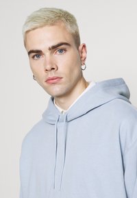 Weekday Sweatshirt com capuz - light blue
