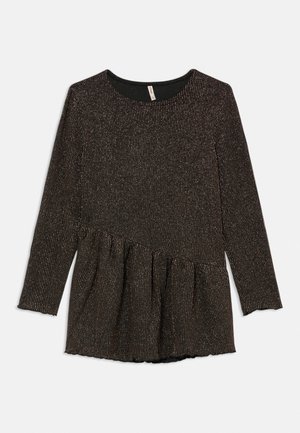 Juodas ilgomis rankovėmis viršus su metalinėmis vertikaliomis juostelėmis ir asimetrišku surinktu peplumo kraštu.