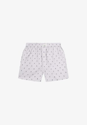 Striped boxers made of cotton, featuring a small skull pattern in navy on a light background, elastic waistband, and a single button closure.