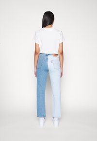 Levi's® CROP - Calças de ganga de perna direita - of two minds