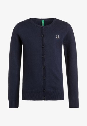 Navy blue button-up cardigan with long sleeves, ribbed cuffs and hem, and a small white embroidered logo on the left chest.