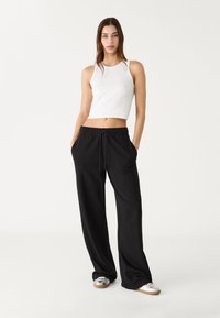 Stradivarius WIDE JOGGER - Pantalon de survêtement - black