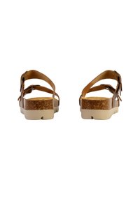 Sandales en cuir marron avec des sangles ajustables, semelle en liège texturé et semelle en caoutchouc de couleur claire, vues de l'arrière.