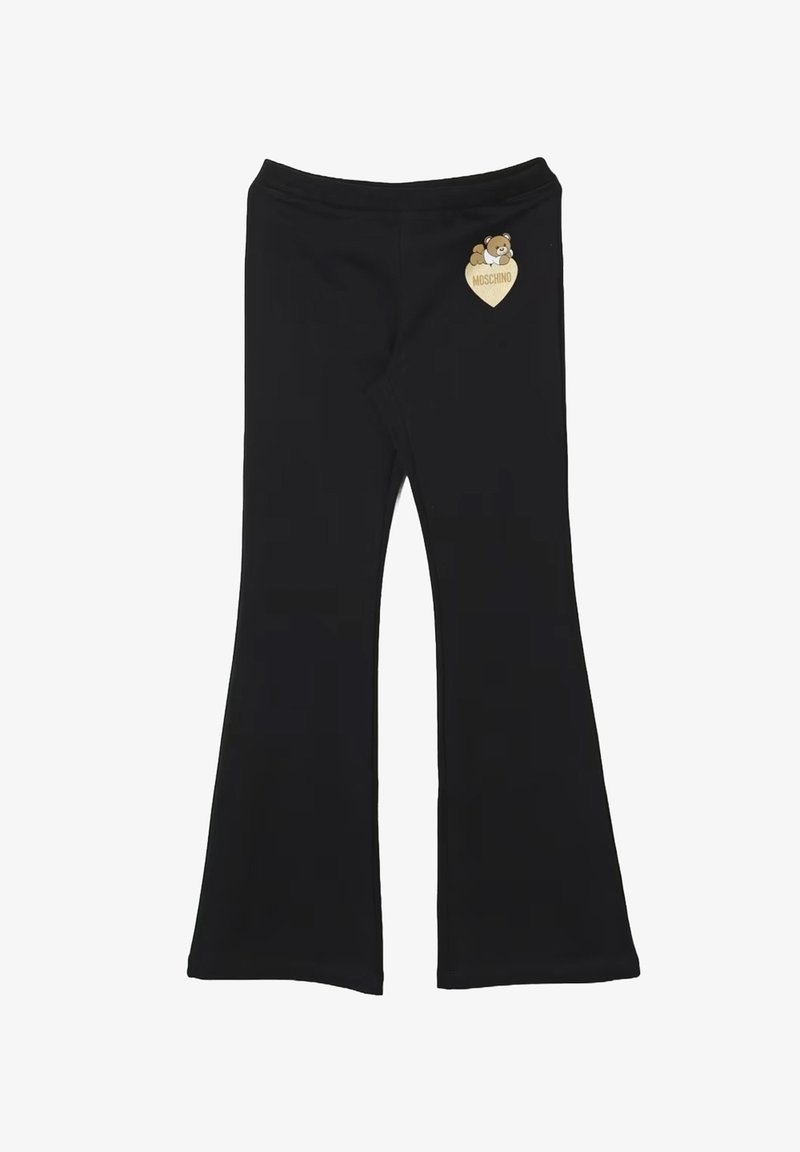 Pantaloni neri a palazzo con vita elastica e una piccola toppa a forma di cuore beige che presenta un orsetto e il testo "Moschino" sull'anca.