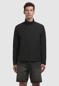 Black jacket with a high collar, front zipper, and side pockets. Made from a smooth, matte material, featuring a minimalistic design.