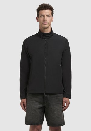Schwarze Jacke mit hohem Kragen, Frontreißverschluss und Seitentaschen. Hergestellt aus einem glatten, matten Material, mit einem minimalistischen Design.