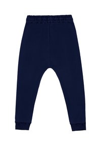 Granatowe spodnie dresowe z elastycznym pasem i mankietami, o luźnym kroju i gładkiej teksturze, zaprojektowane z myślą o komforcie.