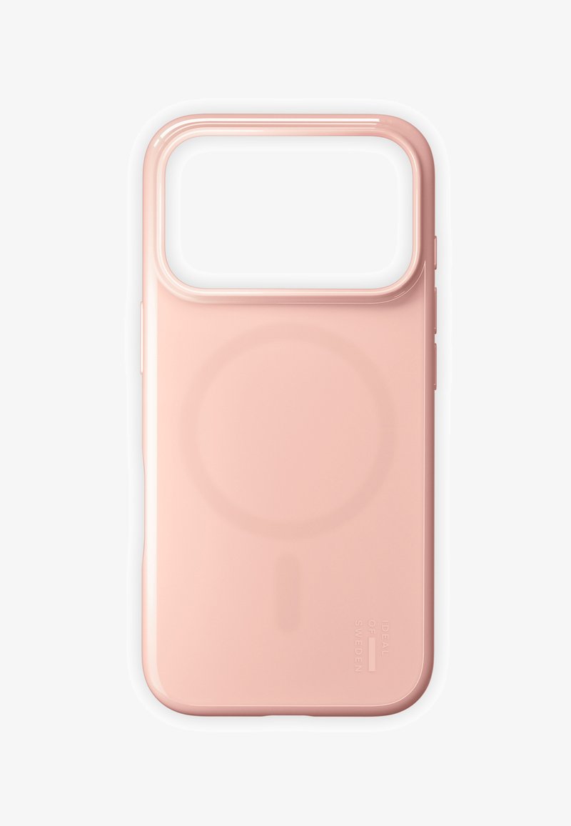 Myk rosa mobildeksel med utskjæring for kamera, glatt finish og subtil sirkulær magnetisk ladeflate på baksiden.