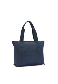 Sac fourre-tout bleu marine en tissu résistant, doté de deux sangles robustes, d'une forme rectangulaire plate et d'une texture subtile sur la surface.