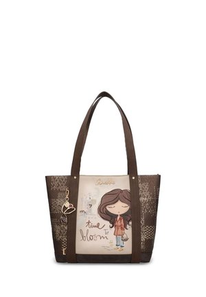 Braune und beige Handtasche mit langen Griffen, mit einem Cartoon-Mädchen, dem Text "time to bloom," und einem herzförmigen Anhänger an der Seite.