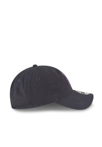 Black baseball cap with a curved brim, embroidered blue and red logo on the side, and ventilation holes along the crown. Cotton material.